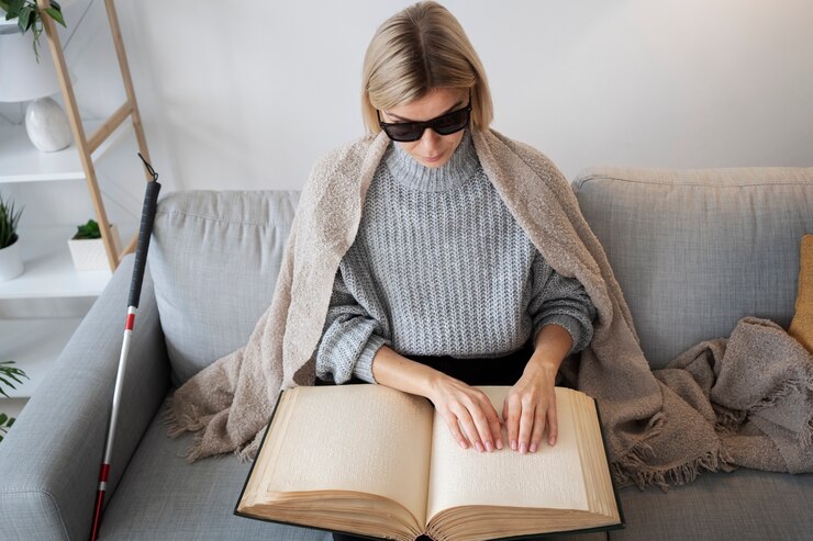 blind person reading a book
