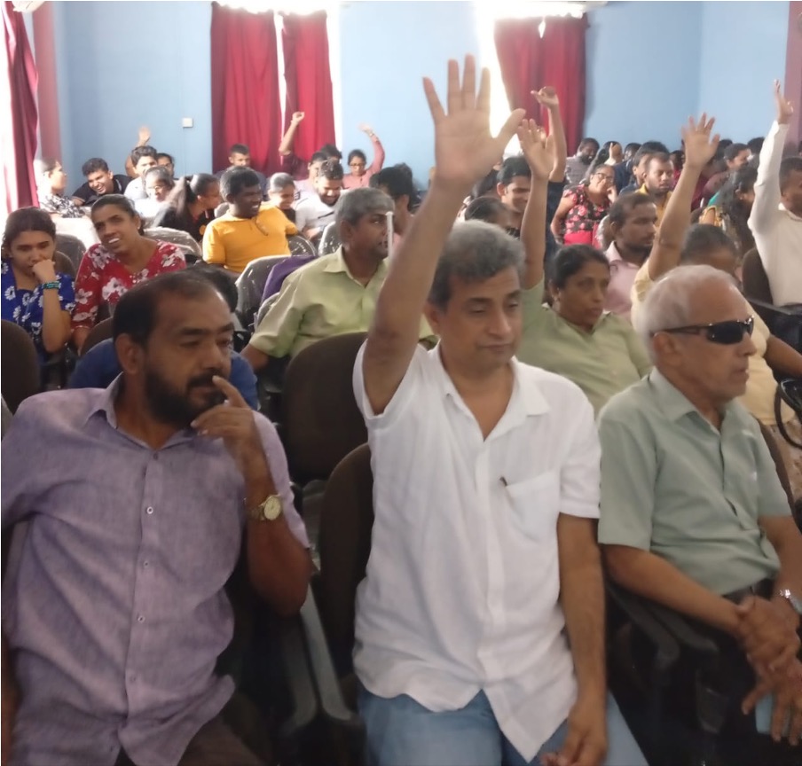 Members participated in electing the new executive committee through a democratic vote by raising hands